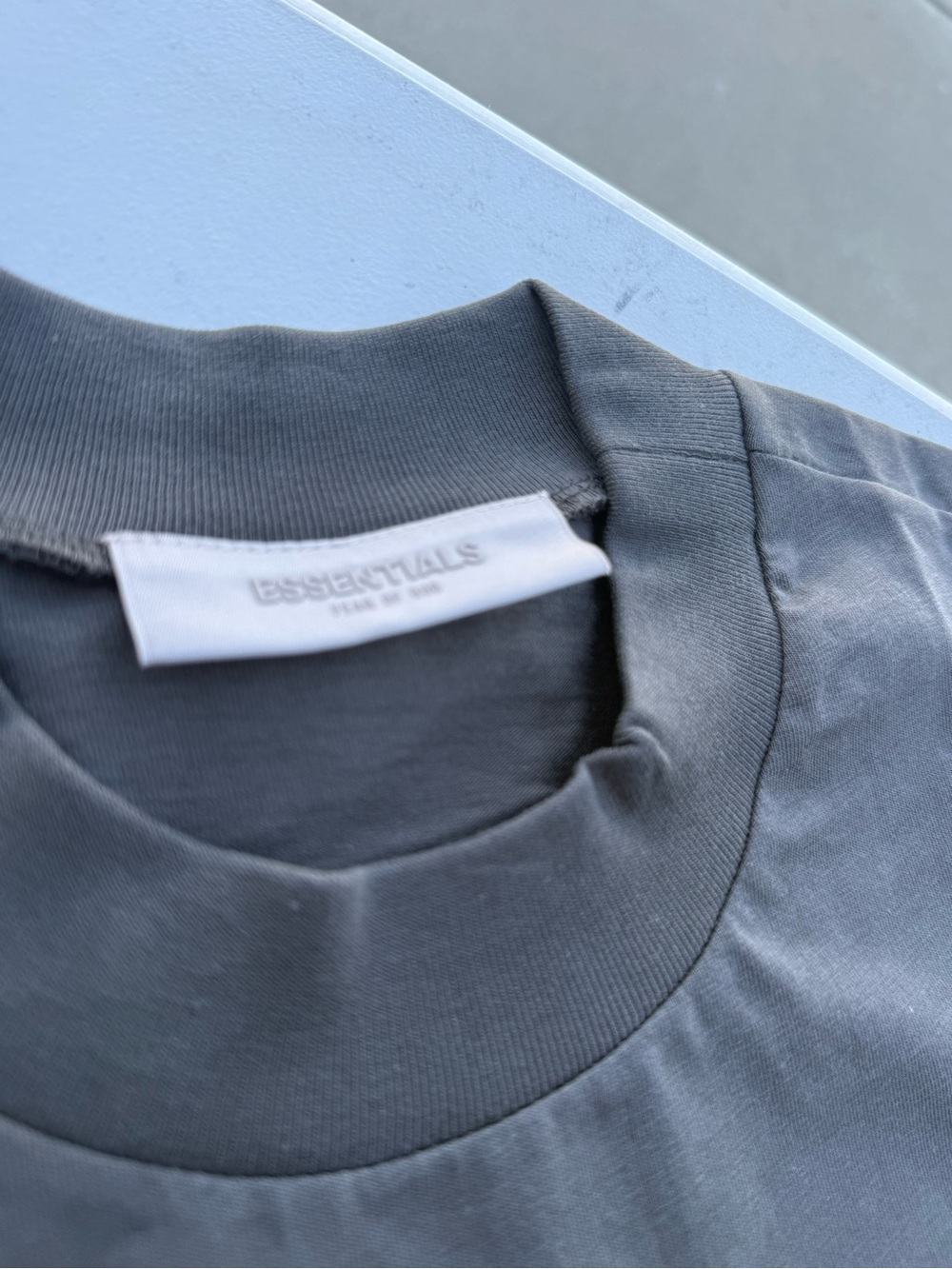 ESSENTIALS Logo Tee in Off black - Picture 2 of 3